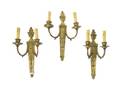 A Set of Three Louis XVI Style Gilt Bronze TwoLight Sconces