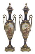 A Pair of Sevres Style Gilt Metal Mounted Porcelain Urns