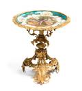 A Sevres Style Porcelain and Gilt Bronze Occasional Table