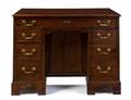 A George III Style Mahogany Kneehole Desk