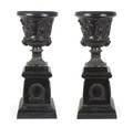A Pair of Victorian Style Cast Iron Urns