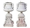 A Pair of White Painted Aluminum Garden Urns