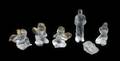 An Assembled Lalique Molded and Frosted Glass Figural Set