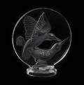A Lalique Molded and Frosted Glass Paperweight