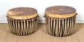 A Pair of African Leather and Hide Covered Drum Tables
