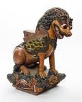 A Burmese Carved and Painted Wood Foo Lion