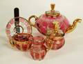 1068 ELEVEN PIECE GILT OVERLAID GLASS TEA SERVICE