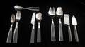 A Lucite and Stainless Steel Flatware Service for Eight