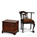 Chippendalestyle Carved Mahogany Roundabout Chair and a Cherry Chest