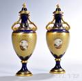 Two Similar Jeweled Coalport Porcelain Vases and Covers