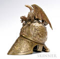 Bronze Helmetform Inkwell late 19th century the helmet decorated with a figural mask centering embossed dragons and scrolled foliage