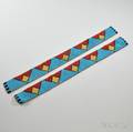 Pair of Assiniboine Beaded Buffalo Hide Strips