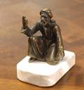 1147 Patinated bronze figure of a kneeling Arab 501