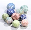 Ten Glazed Carpet Balls