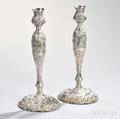 Pair of Sterling Silver Repoussedecorated Candlesticks