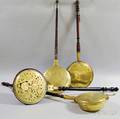 Four Engraved and Pierced Brass and Turned Wood Bedwarmers