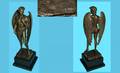 1104 Patinated Bronze Winged Male Figure raised on a b