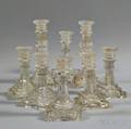 Four Pairs of Colorless Pressed Glass Candlesticks