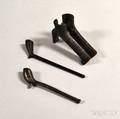 Two Cast Iron Smoking Pipes and a Pipe Mold