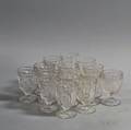 Set of Fourteen Colorless Pattern Glass Pineapple Wines