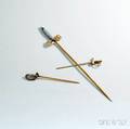 Three 14kt Gold Miniature Swords