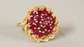 116 18kt Yellow Gold and Rubies RingSet with a domed c