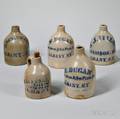 Five Stoneware Advertising Jugs
