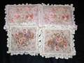 1153 Group of four beige floral tapestry tasseled pill
