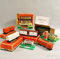 Six Lionel Train Cars and Accessories