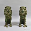 Pair of Patinated Cast Metal Seated Lions