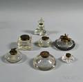 Seven Colorless Glass Inkwells