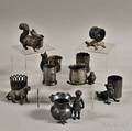 Nine Silverplated Figural Toothpick Holders and a Napkin Ring