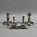 Four Pewter Candlesticks