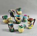 Nine Majolica Pitchers