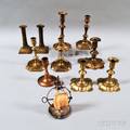 Ten Brass Candlesticks and a Silverplated Taper Jack