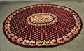 Roomsized Oval Hooked Rug