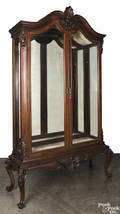 Carved mahogany display cabinet