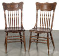 Pair of oak pressed back dining chairs