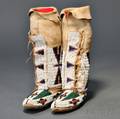 Pair of Central Plains Womans Hightop Moccasins