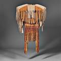 Rare and Important Plains Apache Womans Dress and Moccasins
