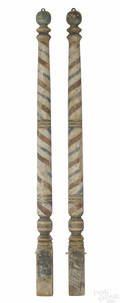 Pair of painted half round barbers poles ca 1900