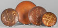 Four Pennsylvania redware plates