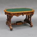 Renaissance Revival Carved Walnut and Walnut Veneer Center Table