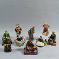 Nine Doulton Character Figures