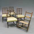 Four George III Oak Dining Chairs and a Blackpainted Ladderback Armrocker