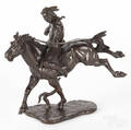 Patinated bronze of a Native American on horseback