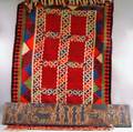 Indian Carved Wood Architectural Panel and a Kilim