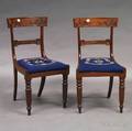 Pair of French Carved Walnut Empire Chairs