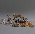 Nineteen Ceramic and Metal Dog Figurines