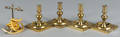 Four English brass candlesticks